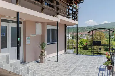 a balcony of a building with stairs and a view at Apartman Pepa in Pirot