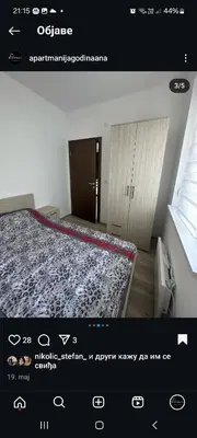 a picture of a bedroom with a bed and a window at apartmanjagodinaana 2 in Trnava