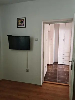 a room with a flat screen tv on a wall at Apartman-Stan in Jagodina
