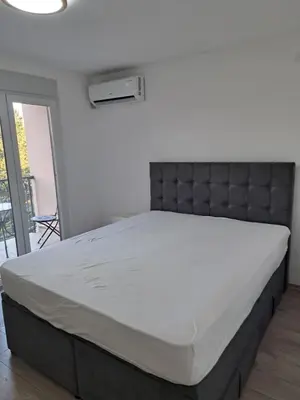 a bed in a room with a large mattress at You See Gold app in Pojate