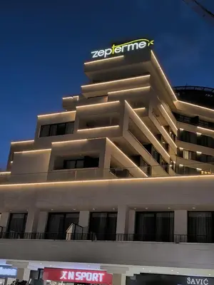 a building with a sign on the top of it at ZEPTERME Promenada - Šetalište in Vrnjačka Banja