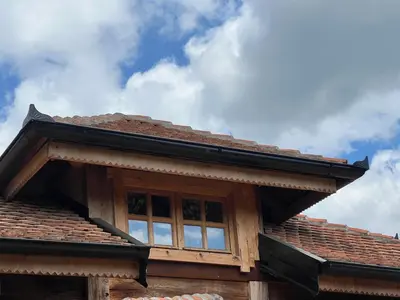 a roof of a house with a window at Brvnara 