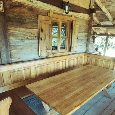 a wooden table in a room with a window at Brvnara 