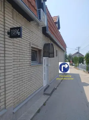 a sign on the side of a building at Top 4 Sobe, Rooms - Near the airport in Niš