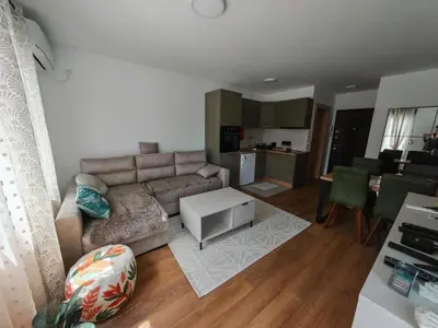 a living room with a couch and a table at Grabak B3 in Vrnjačka Banja