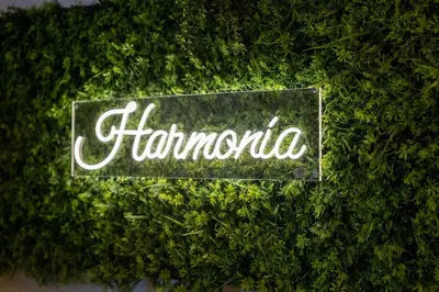 a sign that says horonto on a bush at Harmonia Lux Aqua park in Jagodina