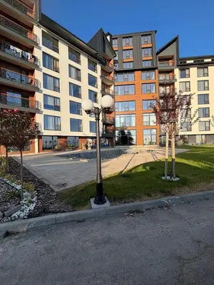 a street light in front of a building at Squirrel Viewpoint Apartment Residence Hill B124 in Kopaonik