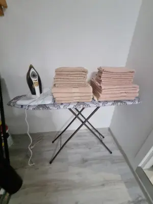 a glass table with towels on top of it at Stan na dan Bor FREE PARKING in Bor