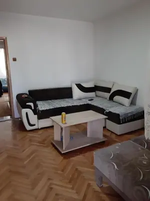 a living room with a couch and a coffee table at Anika in Soko Banja