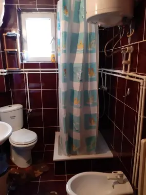 a bathroom with a toilet and a sink at Anika in Soko Banja