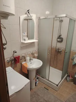 a bathroom with a shower and a sink at Apartman Milosavljevic in Vrnjci