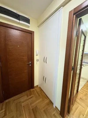 a room with a closet and a door at Vrnjacki kutak in Vrnjačka Banja