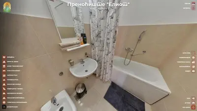 a bathroom with a sink and a tub and a toilet at Apartmani 
