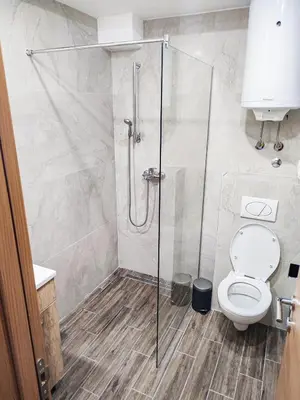 a bathroom with a shower and a toilet at Kopaonik,President kop app 404 in Kopaonik