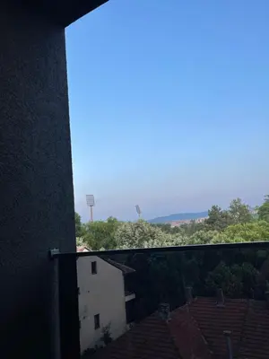 a view of the sky from a building with roofs at Niš Deluxe in Niš