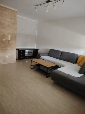 a living room with a couch and a coffee table at Sofi in Jagodina