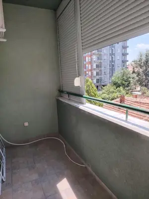 a room with a window with a view of a building at Sofi in Jagodina