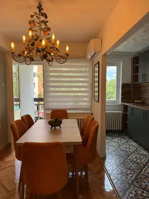 a dining room with a table and chairs at spazio in Knjazevac.