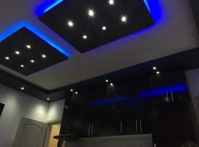 a room with blue lights on the ceiling at Lola Jagodina in Jagodina
