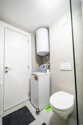 a bathroom with a toilet and a sink at Todorović Lux Vrnjačka Banja in Vrnjačka Banja