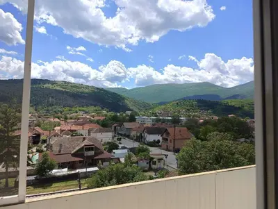 a view of a town with mountains in the background at Doma Toma, Bela Palanka Town in Bela Palanka