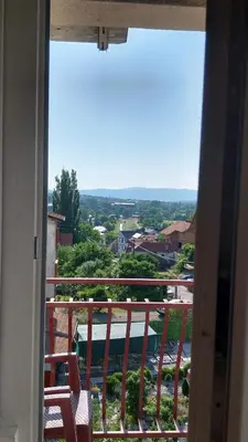a balcony with a view of a city at Orhideja smeštaj Sokobanja in Lepterija