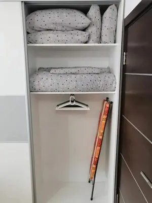 a white drawer with a mattress and a ruler at Studio-apartman DM lux in Vrnjačka Banja