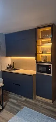a kitchen with a sink and a stove at Sweet dreams apartman in Kopaonik