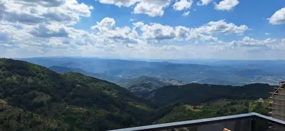 a view of a mountain valley from a building at Sweet dreams apartman in Kopaonik
