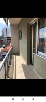a balcony of a building with a view of a city at Zora in Niš
