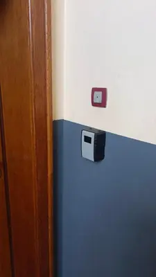 a toaster on a blue wall in a room at Zora in Niš