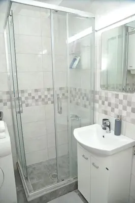 a bathroom with a shower and a sink at Stan na dan Raška in Raška