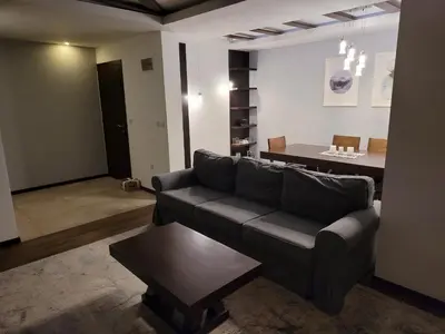 a living room with a couch and a table at Zoi i Nika Kopaonik in Kopaonik