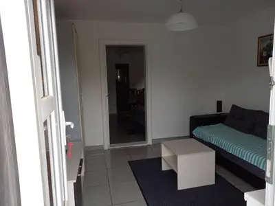 a living room with a couch and a table at Sokobanja in Soko Banja
