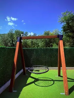 a batting cage with two nets on the grass at CHlLL HILL in Vrnjačka Banja
