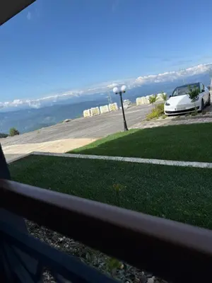 a view from a window of a car parked on a street at A10 Residence hill, Kopaonik in Kopaonik