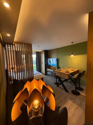 a living room with a couch and a table at A10 Residence hill, Kopaonik in Kopaonik