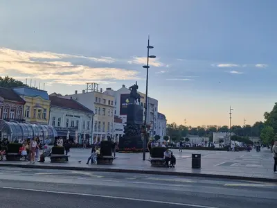 a city square with a statue in the middle of the street at Urban Nest Nis in Niš