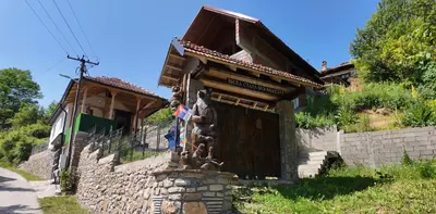 a small house with a stone wall at Vila Stara in Pakleštica