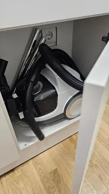 a couple of black cords are in a drawer at Sila apartman Vrnjačka Banja in Vrnjačka Banja