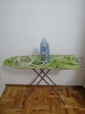 a green table with a fan on top of it at Apartman Smilic Lukovska banja in Lukovo