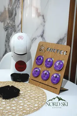 a table with a coffee maker and some purple cookies at Nord Ski - SPA apartman Kraljevi Čardaci in Kopaonik