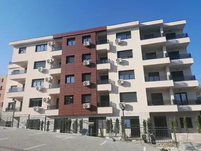 an apartment building with windows and air conditioning at Apartman Orhideja in Vrnjačka Banja