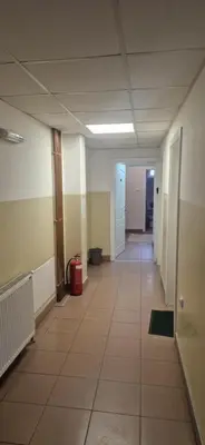 an empty hallway of an office building with a hallway at PlavDom2 in Ćuprija