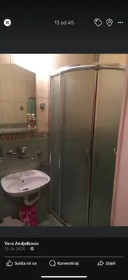 a bathroom with a shower and a sink at Neda in Niš