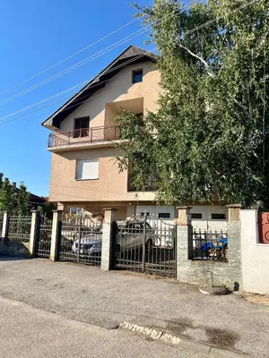 a building with a fence in front of it at Travel Rest in Bujanovac