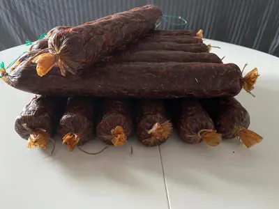 a group of carrots sitting on a table at Travel Rest in Bujanovac