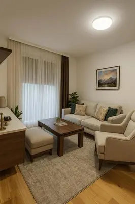 a living room with a couch and a table at Luxury Stay in Vrnjačka Banja D3 in Vrnjačka Banja