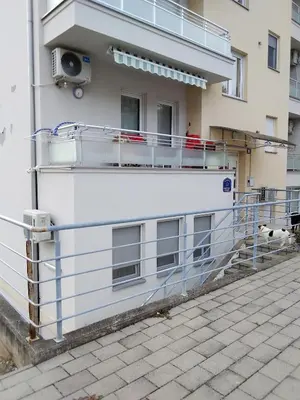 a balcony on the side of a building at Studio apartman BB4 in Vrnjačka Banja