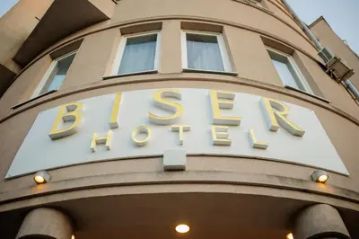 a sign on the side of a building with the word escape at Garni Hotel Biser in Kruševac